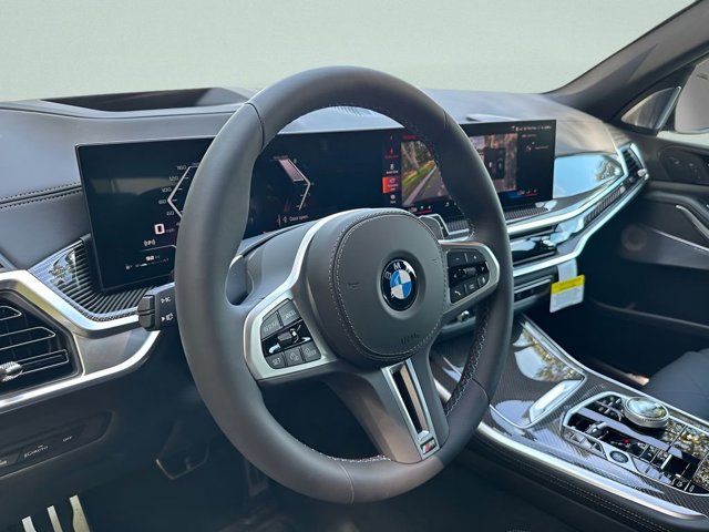 New 2026 Black Sapphire Metallic BMW M60i image 13