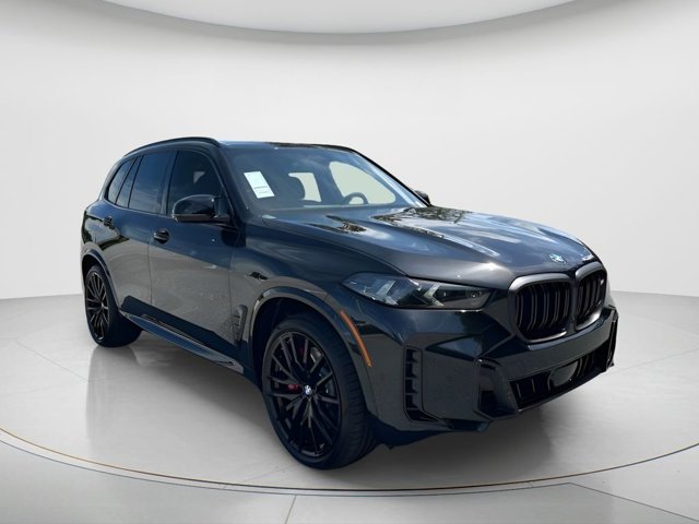 New 2026 Black Sapphire Metallic BMW M60i image 3