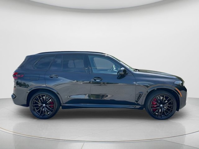 New 2026 Black Sapphire Metallic BMW M60i image 4