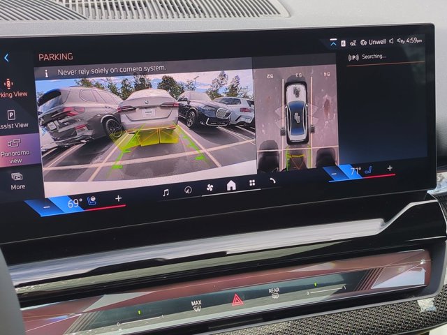 New 2027 Mineral White Metallic BMW 550e xDrive image 24