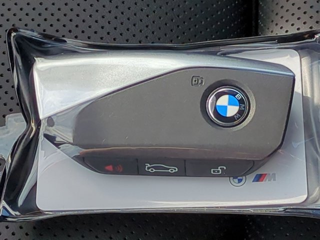 New 2027 Mineral White Metallic BMW 550e xDrive image 33